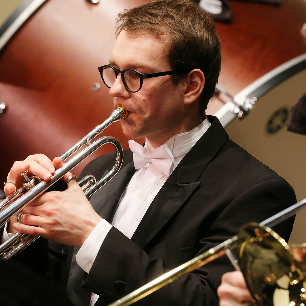 Mathieu Gaillard playing trumpet with the Purdue Philharmonic Orchestra